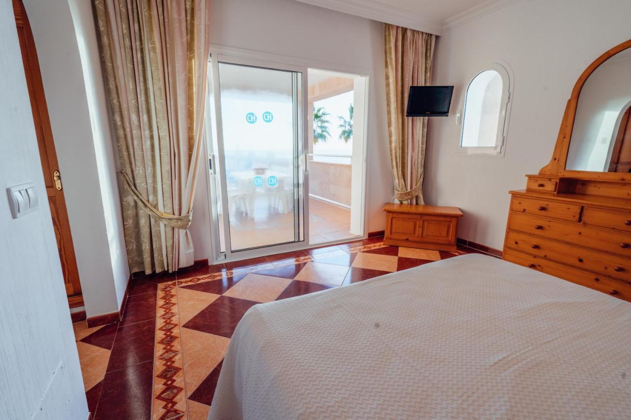 Apartamentos Punta Prima Beach Eksteriør billede